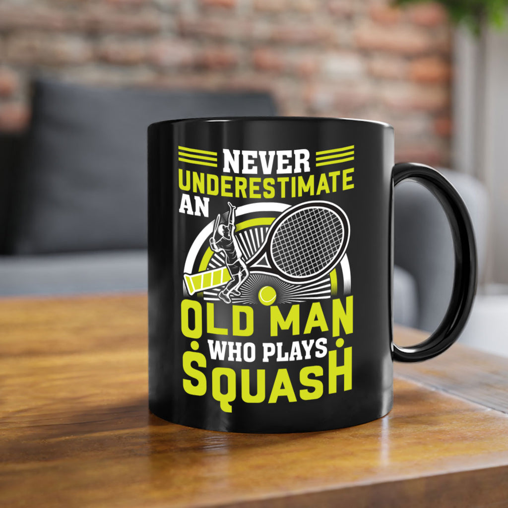 never underestimate a squash player 574#- tennis-Mug / Coffee Cup